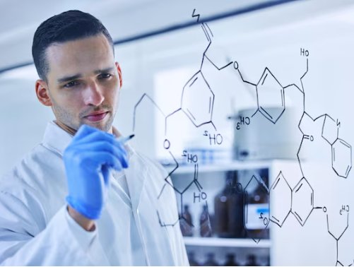 Scientist studying chemistry equations